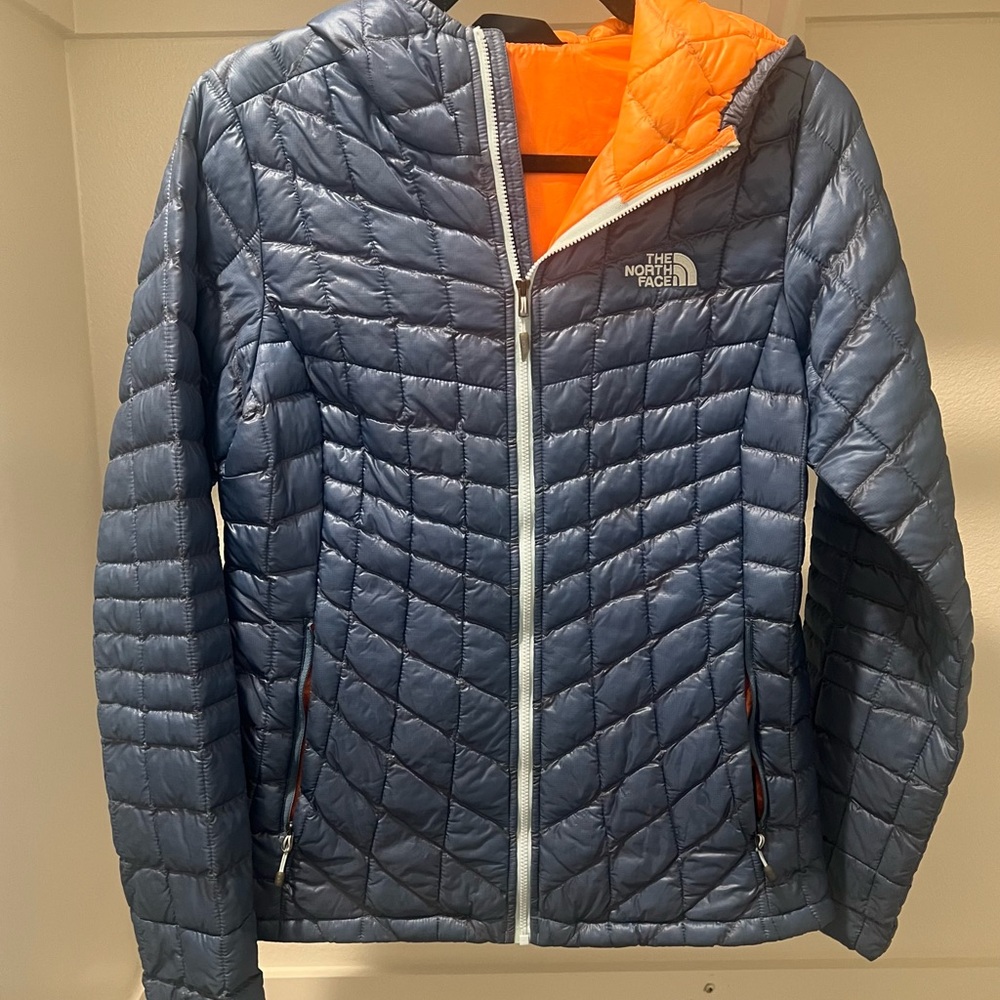 The North Face Navy Quilted Jacket with Bright Orange Interior